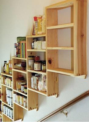 Stairway shallow shelving.  This was written up in Fine Homebuilding issue 215. Uses knotty pine, the golden ratio, finger joints and concealed metal pins.